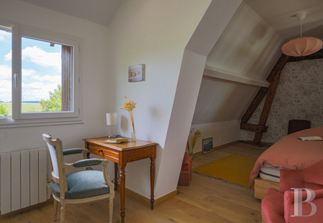 En Normandie, dans le parc régional des Boucles de la Seine, une villa de style anglo-normand - photo  n°25